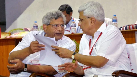 CPI(M) General Secretary Sitaram Yechury with predecessor Prakash Karat. (Photo: PTI)