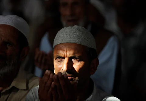 A Kashmiri Muslim man prays inside the shrine of
a Sufi saint during the holy month of Ramadan in Srinagar. (Photo: Reuters)