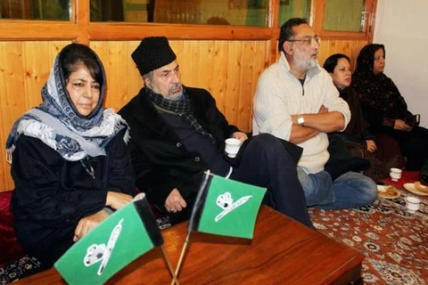 File photo Jammu and Kashmir Chief Minister Mehbooba Mufti with party leaders in Srinagar. (Photo: PTI)