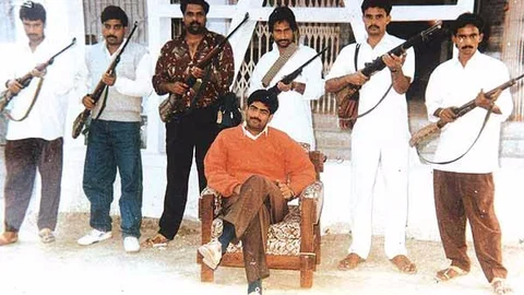 File photo of former Rashtriya Janata Dal strongman Mohammad Shahabuddin (centre) with his armed gunmen. (Photo Courtesy: <a href="http://www.vebidoo.com/mohammad+shahabuddin">Vebidoo</a>)