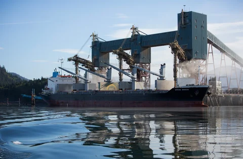 The Spring Breeze bulk carrier freight ship is filled with grain at the Prince Rupert Grain Ltd. terminal of the Port of Prince Rupert in Prince Rupert, British Columbia, Canada. (Photographer: Ben Nelms/Bloomberg)