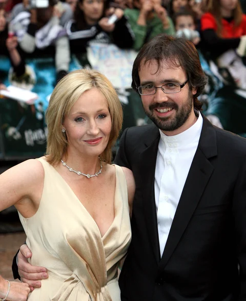 Joanne Rowling and her husband Dr Neil Murray arriving at the premiere of Harry Potter and The Order of the Phoenix in London (Photographer : Chris Ratcliffe/Bloomberg News)