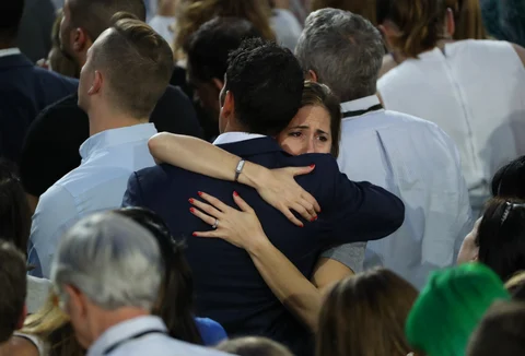 Attendees embrace during an election night party for 2016 Democratic Presidential Candidate Hillary Clinton at the Javits Center in New York. (Photographer: Daniel Acker/Bloomberg)
