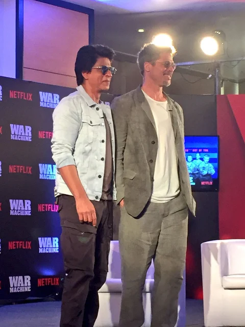 SRK chats with Brad Pitt. (Photo courtesy: Twitter)