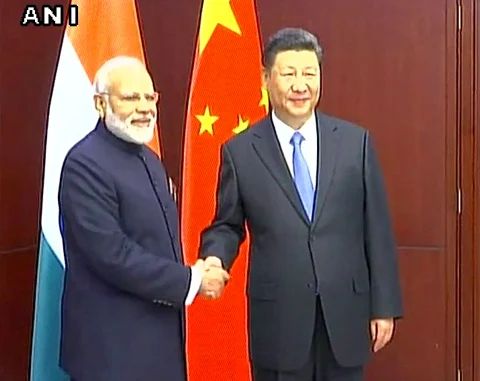 PM Modi with Chinese President Xi Jinping. (Photo Courtesy: ANI Screenshot)