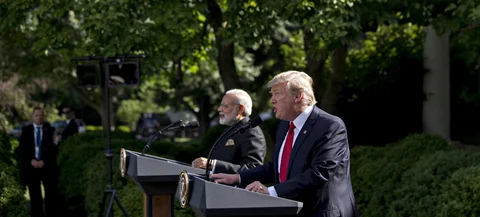U.S. President Donald Trump, right, speaks as Narendra Modi, India’s prime minister, listens during a joint statement in the Rose Garden of the White House in Washington, D.C., on June 26, 2017. (Photographer: Andrew Harrer/Bloomberg)