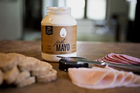 A jar of Hampton Creek Inc. Just Mayo brand egg-less mayonnaise is arranged with deli meats and bread for a photograph in Tiskilwa, Illinois. (Photographer: Daniel Acker/Bloomberg)