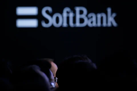 Attendees listen to billionaire Masayoshi Son, chairman and chief executive officer of SoftBank Group Corp. (Photographer: Kiyoshi Ota/Bloomberg)