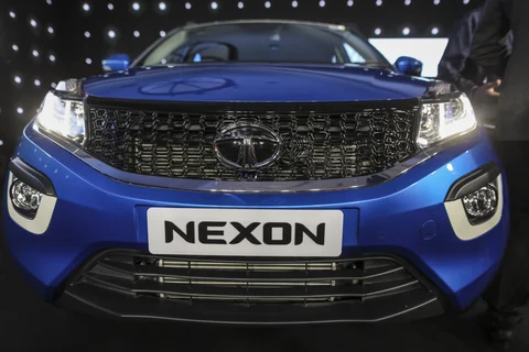 A logo sits on the front of Tata Motors Ltd.’s new Nexon sports utility vehicle (SUV) during a launch event in Mumbai (Photographer: Dhiraj Singh/Bloomberg)