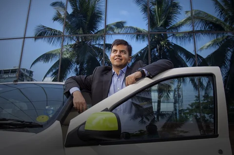 Bhavish Aggarwal, chief executive officer and co-founder of Ola, stands for a photograph in Bengaluru, India. (Photographer: Namas Bhojani/Bloomberg)