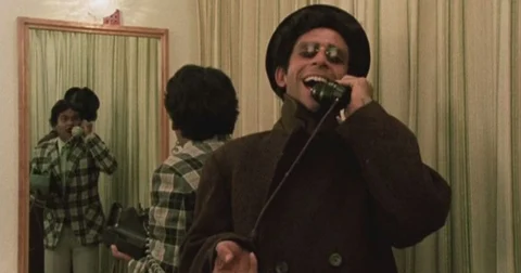 Naseeruddin Shah and Satish Kaushik in the ‘telephone’ scene from <i>Jaane Bhi Do Yaaro.</i>