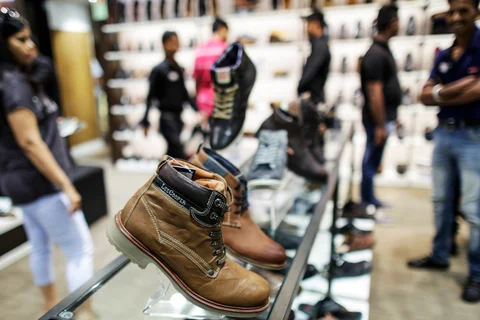 Lee Cooper men’s shoes sit on display in a Shoppers Stop Ltd. store in the Malad area of Mumbai. (Photographer: Dhiraj Singh/Bloomberg)