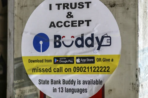 A sign for mobile digital payment app State Bank Buddy, operated by State Bank of India (Photographer: Dhiraj Singh/Bloomberg)