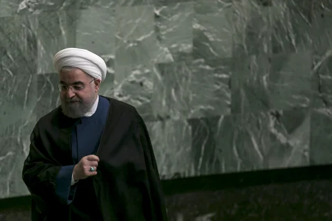 Hassan Rouhani, Iran’s president, exits the podium after speaking during the UN General Assembly meeting in New York. (Photographer: Caitlin Ochs/Bloomberg)