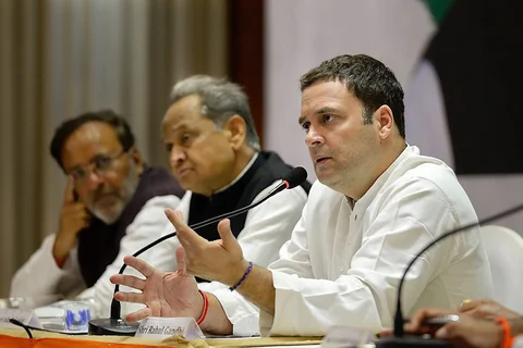 Congress President Rahul Gandhi, along with Gujrarat state in-charge Ashok Gehlot, and Arjun Modhwadia, in Gujarat, on December 12, 2017. (Photograph: PTI)