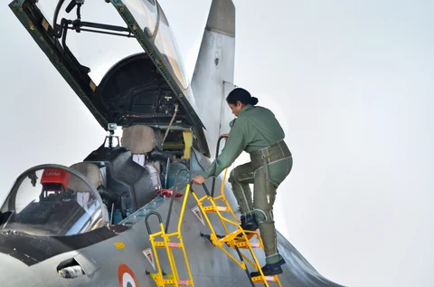 Defence Minister Nirmala Sitharaman boards IAFs Sukhoi-30 MKI plane for a sortie, in Jodhpur. (Image: PTI)
