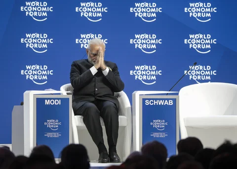 Narendra Modi, India’s prime minister, gestures during a plenary session on the opening day of the World Economic Forum (WEF) in Davos, Switzerland. (Photographer: Jason Alden/Bloomberg)