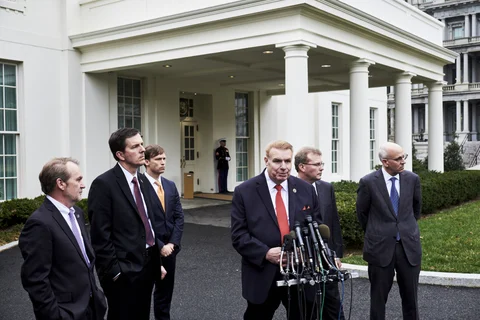 John Ferriola, president and chief executive officer of Nucor Corp., center, speaks with members of the media following a meeting with U.S. President Donald Trump and steel and aluminum executives at the White House in Washington, D.C., U.S., on March 1, 2018. (Photographer: T.J. Kirkpatrick/ Bloomberg)
