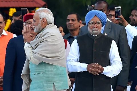 Prime Minister Narendra Modi and Former Prime Minister Manmohan Singh in New Delhi. (Photograph: PTI)