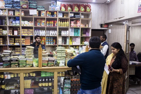 Customers browse at a Patanjali Ayurved Ltd. store in New Delhi, India. (Photographer: Udit Kulshrestha/Bloomberg) 