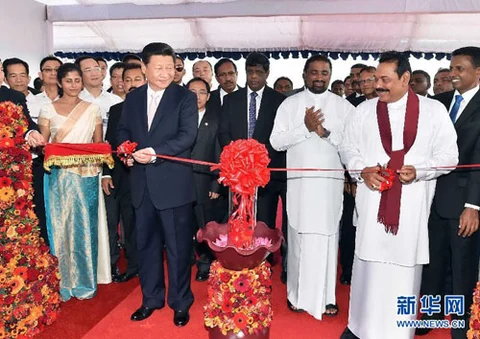 Chinese President Xi Jinping, accompanied by then President Mahinda Rajapaksa of Sri Lanka, inspected the South Container Terminal of Colombo Port, on September 17, 2014. (Photograph: Chinese Ministry of Foreign Affairs)