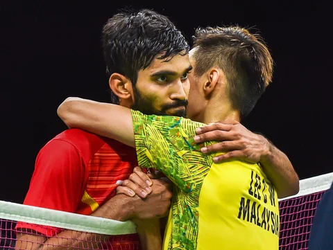 Malaysia’s Lee Chong Wei and India’s Srikanth Kidambi exchange greetings after their men’s singles badminton gold medal match. (Source: PTI)