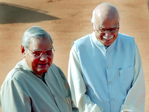 File photo of former Indian Prime Minister Atal Bihari Vajpayee and former Deputy Prime Minister LK Advani in New Delhi on October 13, 2003. (Photographer: Sondeep Shankar/Bloomberg News)
