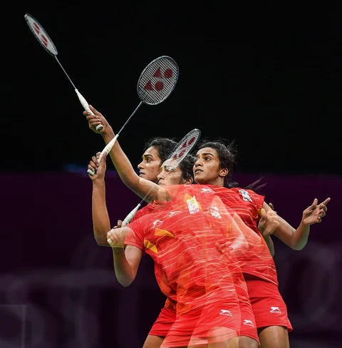 PV Sindhu returns a shot to her compatriot Saina Nehwal during women’s singles badminton gold medal match at the CWG 2018. (Source: PTI)