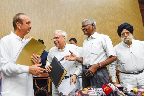 Congress leaders Ghulam Nabi Azad, Kapil Sibal, CPI’s D Raja and KTS Tulsi during a press conference after opposition parties submitted a notice to the Vice President and Rajya Sabha Chairperson Venkaiah Naidu to initiate impeachment proceedings against Chief Justice of India Dipak Misra, in New Delhi on April 20, 2018. (Photograph: Kamal Singh/PTI)