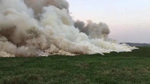 Smoke around the Bellandur lake in Bengaluru. (Source: The Quint)