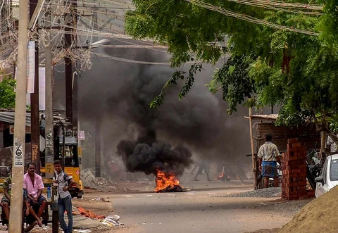 Burning tyres are seen placed to block a road during a protest demanding the closure of Vedantas Sterlite Copper unit, in Tuticorin. (Source: PTI)
