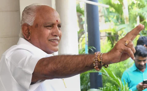 BJP’s chief ministerial candidate B S Yeddyurappa shows victory sign during a press conference, a day after polling for Karnataka Assembly elections, in Bengaluru on May 13, 2018. (Photograph: Shailendra Bhojak) 