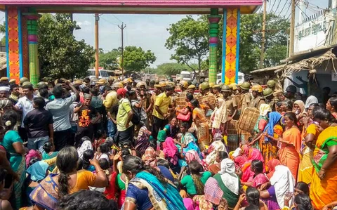 Police personnel tackles the agitators demanding the closure of Vedantas Sterlite Copper unit as the protest enters the 100th day, in Tuticorin. (Source: PTI)