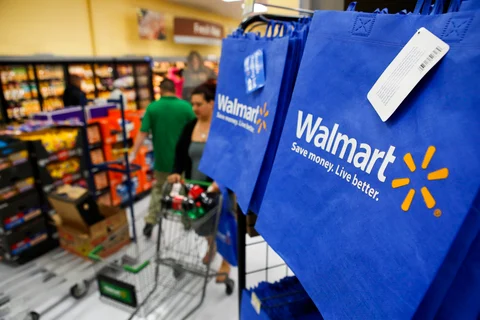 Customers at a Walmart store in California, U.S. (Photographer: Patrick T. Fallon/Bloomberg)