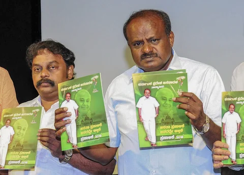 Janata Dal (Secular) President HD Kumaraswamy with party leaders release a party manifesto ahead of Karnataka Assembly Elections. (Photograph: PTI)