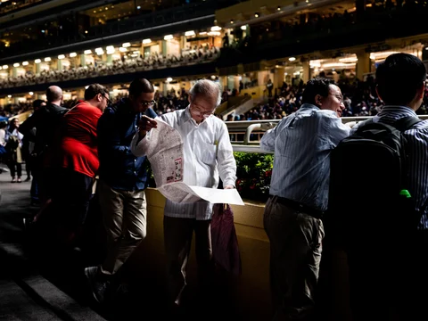The Hong Kong Jockey Club now offers individual gamblers tools to help them mimic the betting patterns of the syndicates. (Photographer: Xyza Bacani/ Redux For Bloomberg Businessweek)