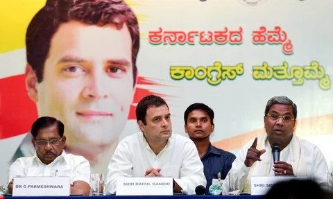 Congress President Rahul Gandhi with then Karnataka Chief Minister Siddaramaiah and KPCC President G Parameshwara, in Bengaluru, on May 10, 2018. (Photograph: Shailendra Bhojak/PTI)
