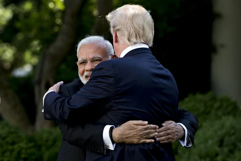 Narendra Modi, India’s prime minister, hugs U.S. President Donald Trump in the Rose Garden of the White House in Washington, D.C., U.S., on June 26, 2017. (Photographer: Andrew Harrer/Bloomberg)