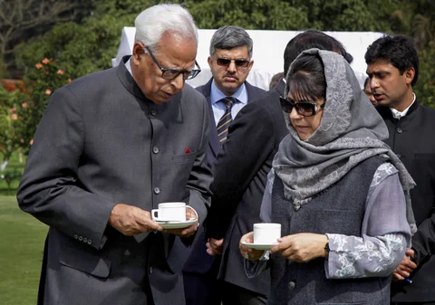 In this file photo dated February 17, 2017, J&K Governor NN Vohra is seen with Chief Minister of J&K Mehbooba Mufti after a swearing-in ceremony. (Source: PTI)