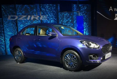 The new Dzire unveiled at the launch in New Delhi. (Photographer: Rajinder Kumar/Bloomberg)