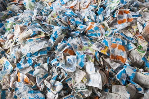 Arranged household waste sits in a warehouse (Photographer: Samyukta Lakshmi/Bloomberg)