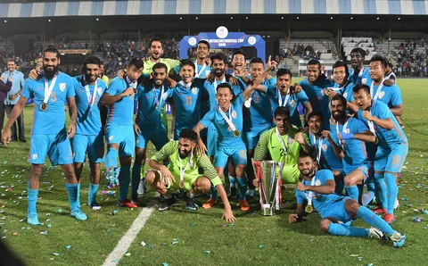 Indian team celebrate with the winning trophy after beating Kenya in final at the Hero International Cup football, in Mumbai on Sunday. (Source: PTI)