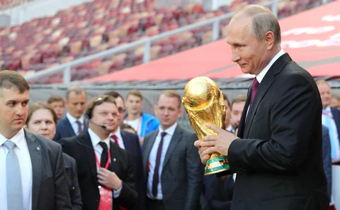 A photo of Vladimir Putin holding the World Cup trophy at the Luzhniki Stadium in Moscow released by the Kremlin. (Source: <a href="http://ww.kremlin.ru">Kremlin Website</a>)