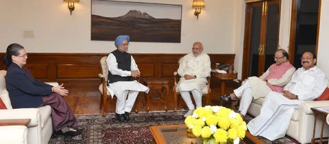 Prime Minister Narendra Modi meeting former Prime Minister Manmohan Singh and then Congress President Sonia Gandhi, in New Delhi on November 27, 2015. (Photograph: PIB)<a href="http://pibphoto.nic.in/photo//2015/Nov/l2015112773987.jpg"><i><br></i></a>