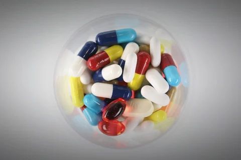 Brightly coloured pharmaceutical medication, including antibiotics, paracetamol, Ibuprofen and cold relief tablets in the U.K. (Photographer: Chris Ratcliffe/Bloomberg)