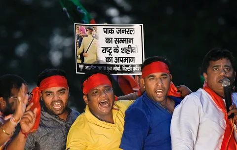 Delhi BJP Yuva Morcha workers stage a protest against Punjab Minister Navjot Singh Sidhu for visiting Pakistan, in New Delhi on August 21, 2018. Photograph: Kamal Singh/PTI)