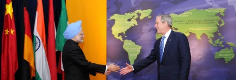 Then Indian Prime Minister Manmohan Singh welcomed by U.S. President George W. Bush, for the Summit on Financial Market and the World Economy, at Washington D.C., on November 14, 2008. (Photograph: PIB)