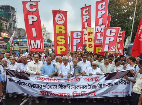 Left Front Chairman Biman Bose and other activists participate in a rally to protest against the recent police raids on the premises of social activists and their house arrest, in Kolkata on August 30, 2018. (Photograph: Swapan Mahapatra/PTI)