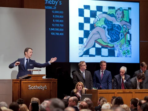 Bids are placed on a painting by Henri Matisse, during Sotheby’s Impressionist & Modern Art evening sale in New York, U.S. (Photographer: Tom Starkweather/Bloomberg)