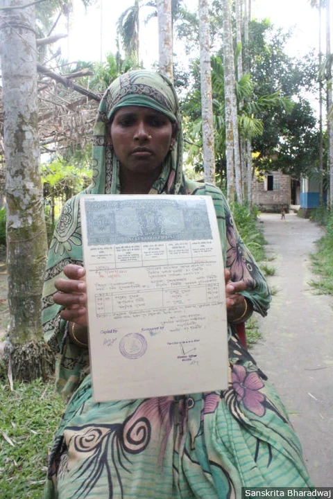 Moriam Begum, 33, with a certificate copy of the 1966 electoral rolls with her grandfather’s name. She received a notice in 2015 from the Assam Border Police Organisation, asking her to prove her citizenship at the foreigner’s tribunal in Bongaigaon. Aklima Bewa, 62, Moriam’s mother, killed herself in 2016 fearing for her daughter’s citizenship, said the family.